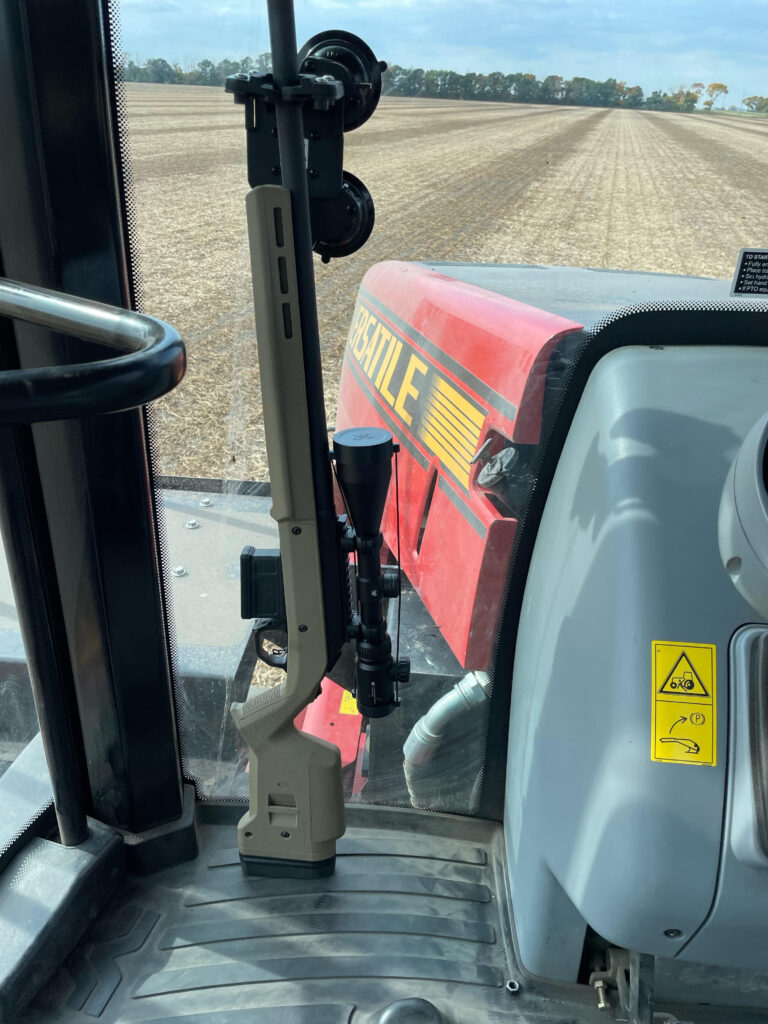Buck Volk Gun Rack Customer in his Versatile tractor